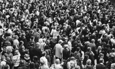 Black and white picture of crowd outside