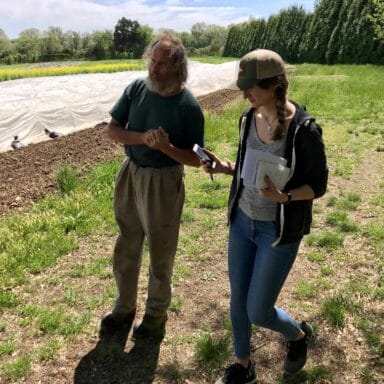 Reporter Lisa Held with a farmer